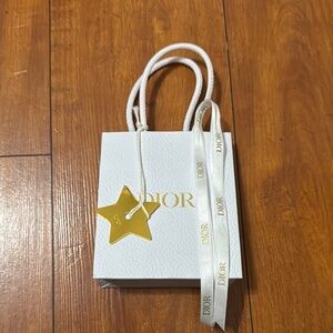 Small and large  Dior gift bag with ribbon